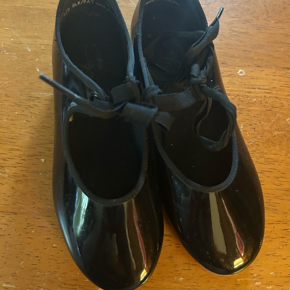 Elegant black tap shoes for dance class